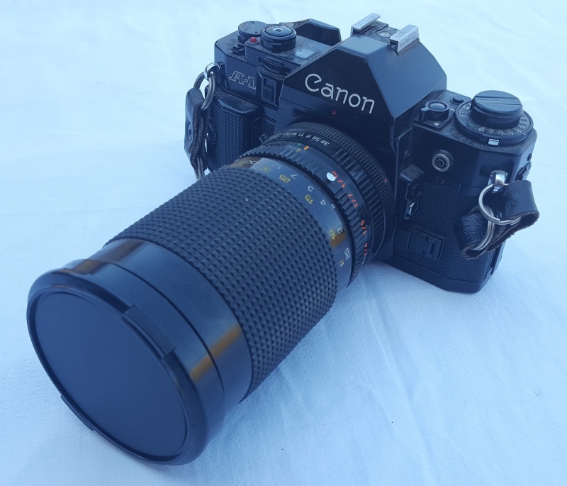 Canon A1 Reflex con teleobiettivo
